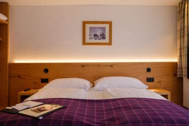 Gemütlich eingerichtetes Zimmer vom Hotel Bella Vista Zermatt